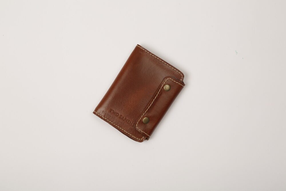 Tan brown leather wallet with dual snap button – handcrafted by Two Sapiens