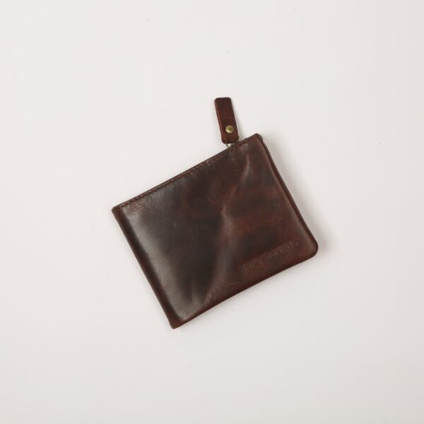 Black leather bifold wallet with card slots, zipper compartment and brass snap buttons – handmade by Two Sapiens
